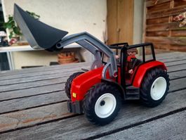 Playmobil Traktor mit Schaufel und Fahrer