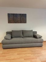 Graues Schlafsofa in gutem Zustand
