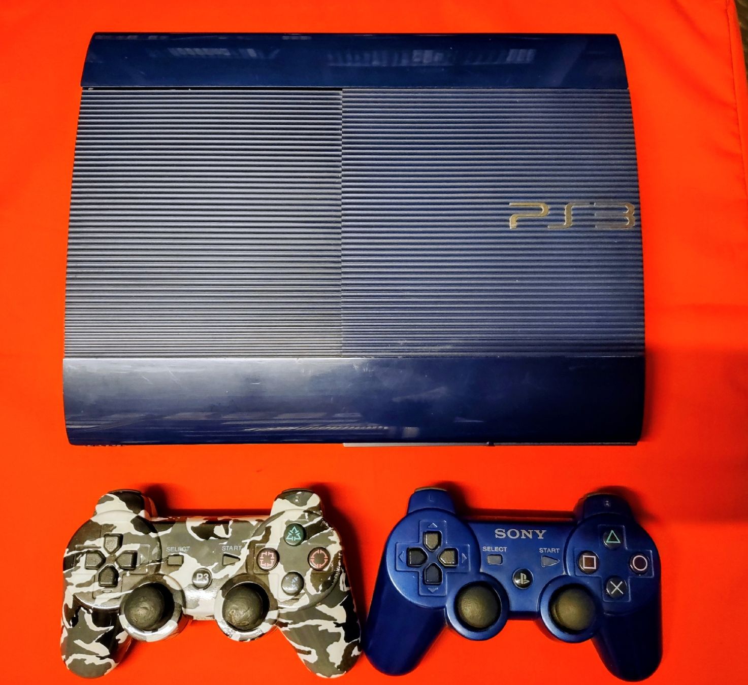 Sony Console: PS3 Bleue + 2 Manettes - – Usato da fribourg venduto da GameSpot