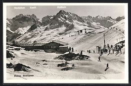 Davos, Skifahrer, Berghütte und Strelap
