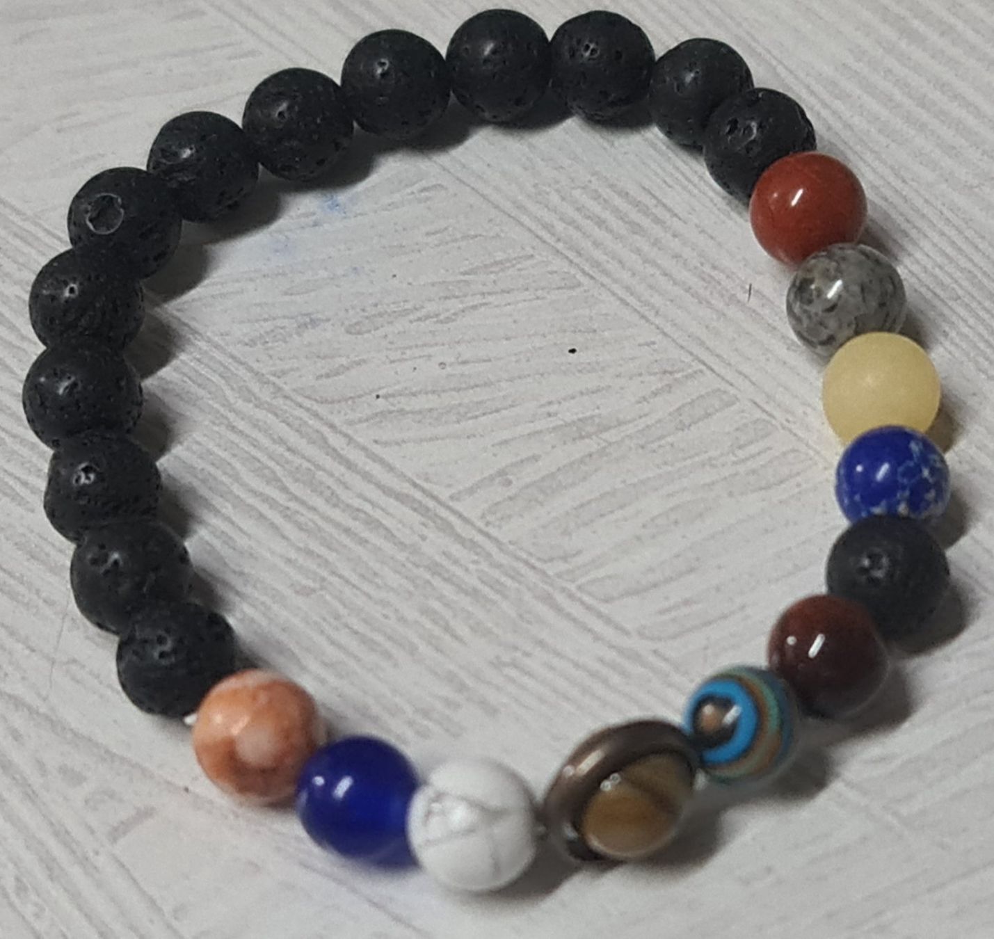 Bracciali & Braccialetti: Solar System Planeten Armband aus Stein – Nuovo e nell'imballaggio originale da Uerkheim venduto da Kaufoption 6