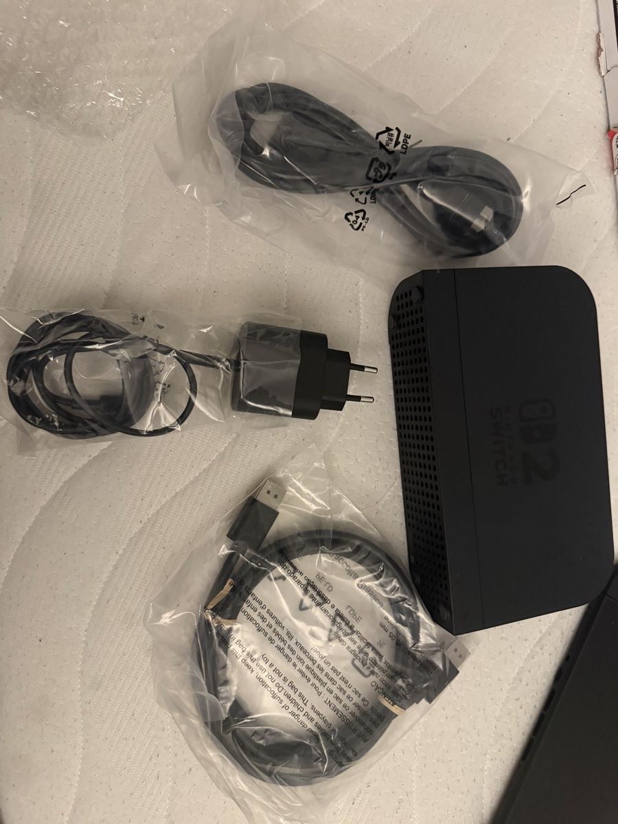 Nintendo Konsolen: Console Nintendo Switch 2 OLED + Jeux + Manette Pokemon – Neu (gemäss Beschreibung) aus Biel/Bienne von LivaiTaisho 2