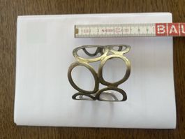 Bracciale bangle rigido design scultoreo in metallo argentat