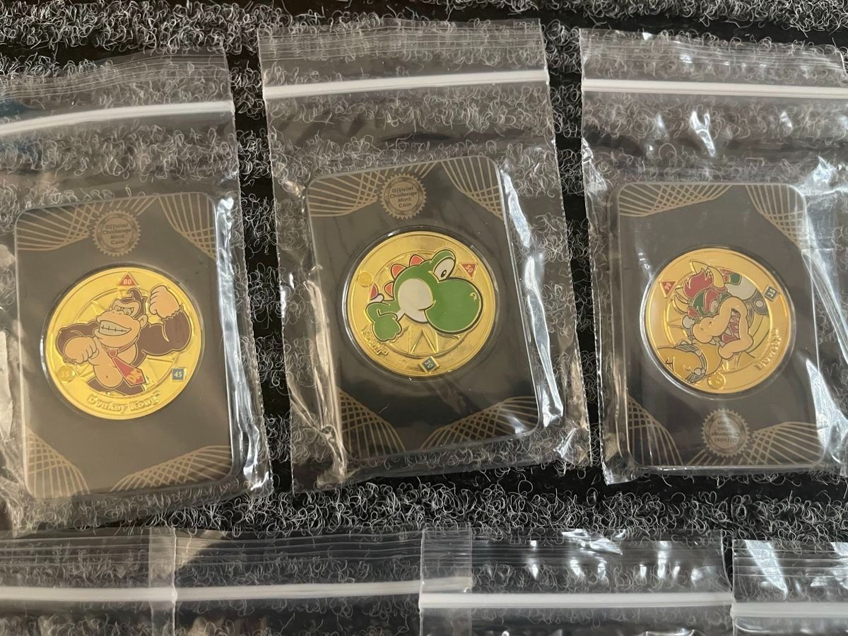 Tutti le monete: 18 Stk. Nintendo Super Mario Challenge Coins + Displaybrett – Nuovo e nell'imballaggio originale da Aesch BL venduto da CollectorsBest 6