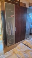 Kleiderschrank mit 4 Tueren Holzoptik/Milchglas gebraucht
