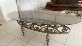 Glastisch mit Schmiedeisengeatell oval gut erhalten