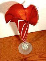 Red and white decorative glass vase. Stylish decor