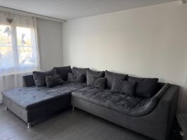 Ecksofa Stoff dunkelgrau mit Kissen gebrauchter Zustand