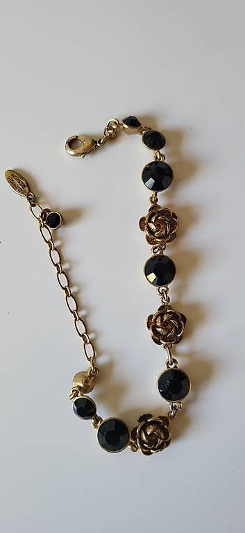 Bracciali & Braccialetti: Armband goldfarbig / schwarz – Usato da Duggingen venduto da lot-of-fun 1