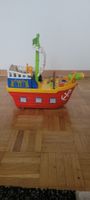 Bateau pirate jouet à roulettes, lumineux  musical 35x35x20
