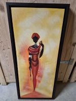 Tableau Afrique femme stylisée cadre noir