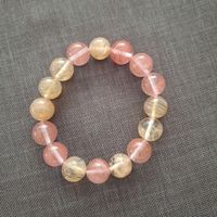 Handgefertigtes Armband in Rosa- und Goldtönen