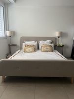 Upholstered bed beige fabric frame good condition