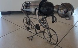 Porte-bouteille original personnage sur vélo métal