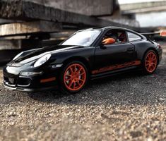 1999 Porsche GT3 RS Modellauto 1/24 (Schwarz/orange)