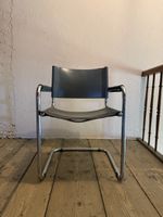Armchair grey leather chrome frame cantilever chair