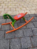 Schaukelpferd Holz grün-orange