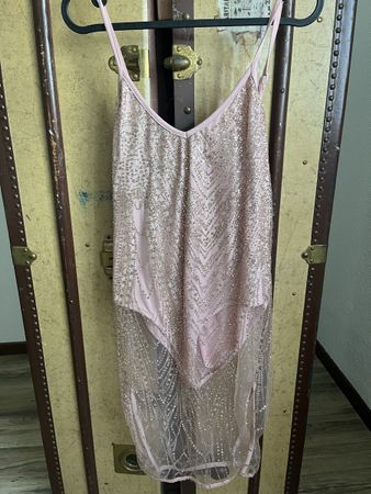 Body rosa con paillettes taglia S usato