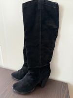 29. Bottes en cuir (un peu cuisarde)