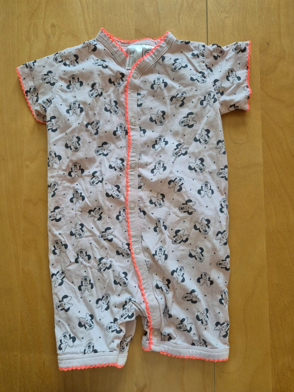 Tute: H&M Disney Strampler Daisy, Gr. 80, Versand möglich – Usato da Reinach AG venduto da scud-werfer17