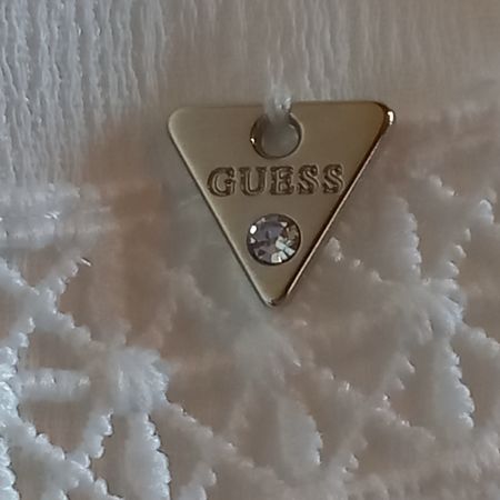 GUESS Top blanc taille L avec dentelle.