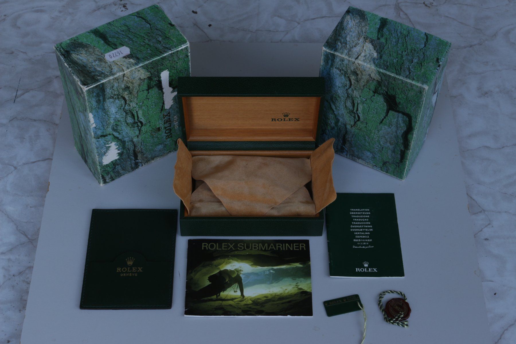 Uhrenboxen: Rolex Uhrenbox mit Zubehör – Gebraucht aus Niederhasli von swisslos