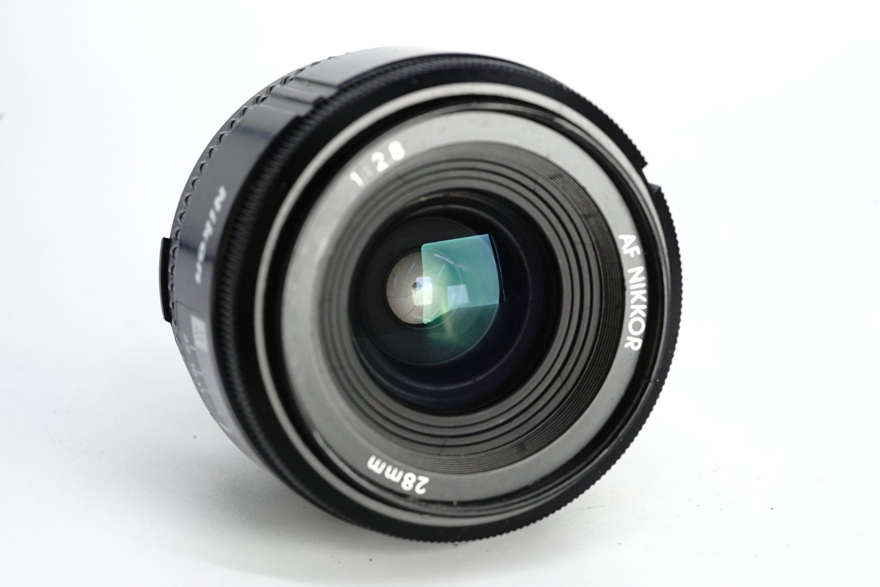 Nikon Objektive: AF Nikkor 28mm 1:2.8 – Gebraucht aus Bischofszell von Blende2