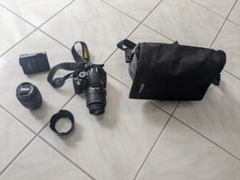 Nikon D3100 DSLR Camera with Two Lenses and Accessories