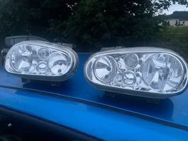 VW Golf IV Scheinwerfer-Set (rechts + links) inkl. Mo-Anl.