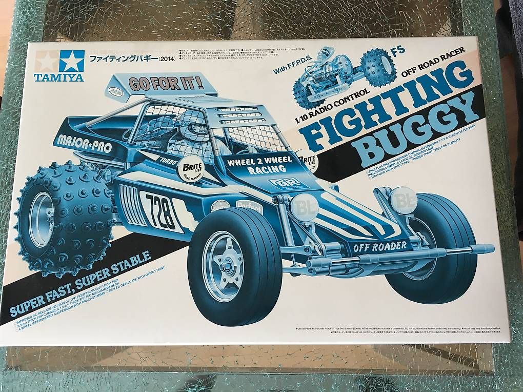 Tamiya Modellismo RC: Tamiya Fighting Buggy Bausatz Re-Release 2014 NEU – Nuovo e nell'imballaggio originale da holziken venduto da Weston