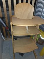 Kinderhochstuhl aus Holz, robust und bereit!