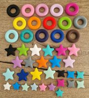 Bunte Silikonformen Sterne und Dognuts neu und nach Norm