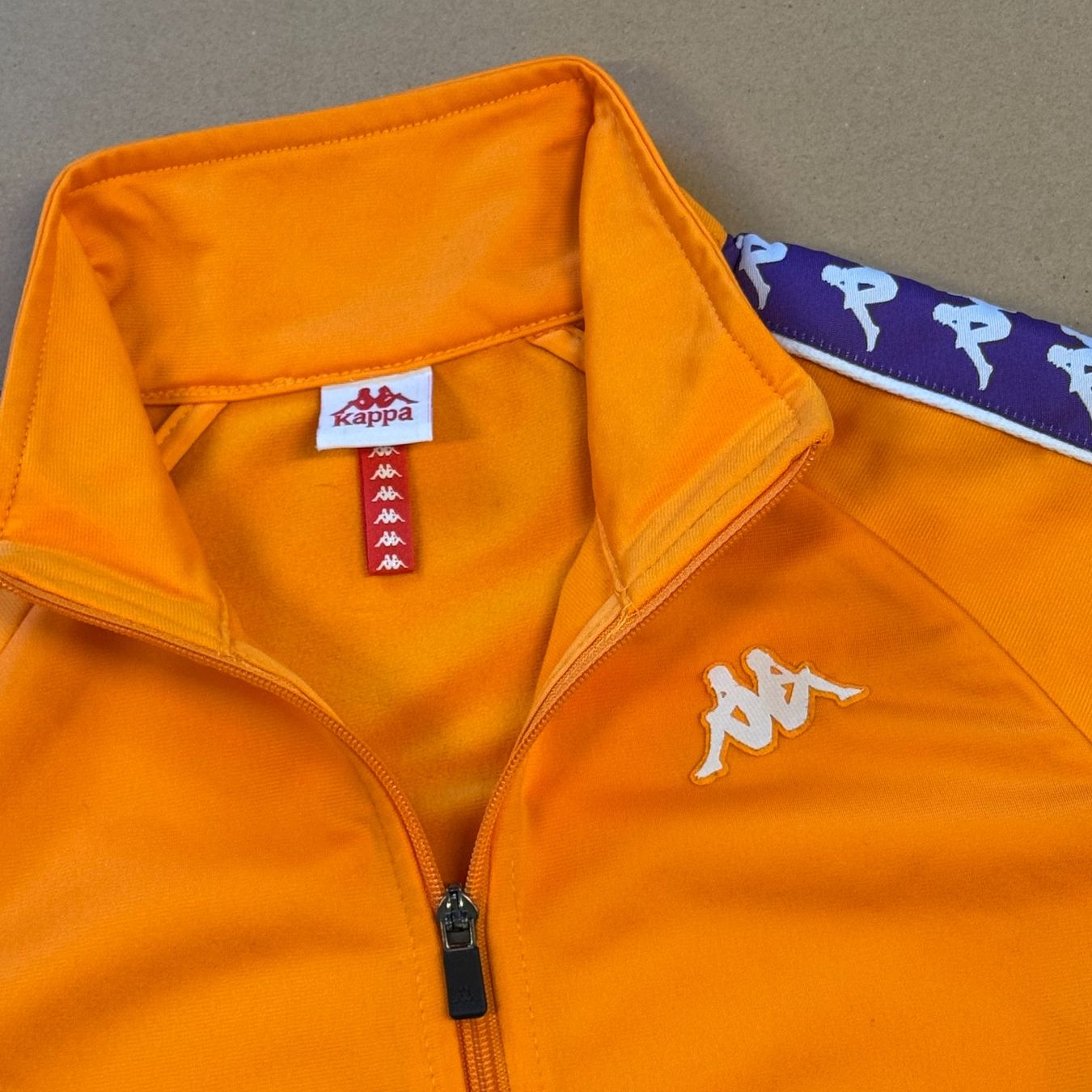 Kappa Jacken: Kappa Trainingsjacke orange/violett, Gr. XS – Gebraucht aus St. Gallen von sourced_limited 1