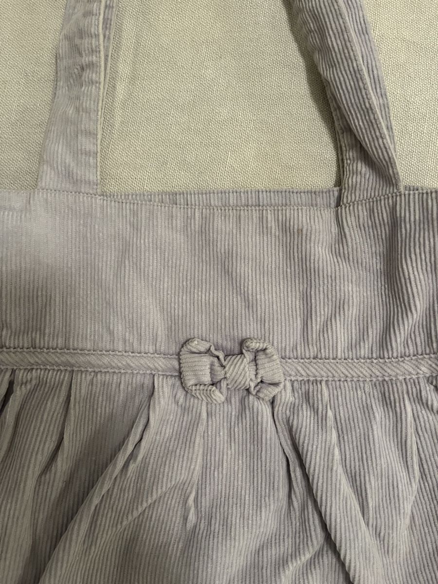 Borse da donna: Borsa Subdued con fiocco a coste lilla chiaro. – Usato da Mendrisio venduto da cost.del 2