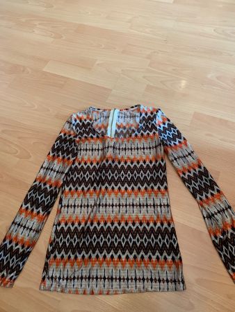 Joli pull motifs vintage taille S ou 36-38
