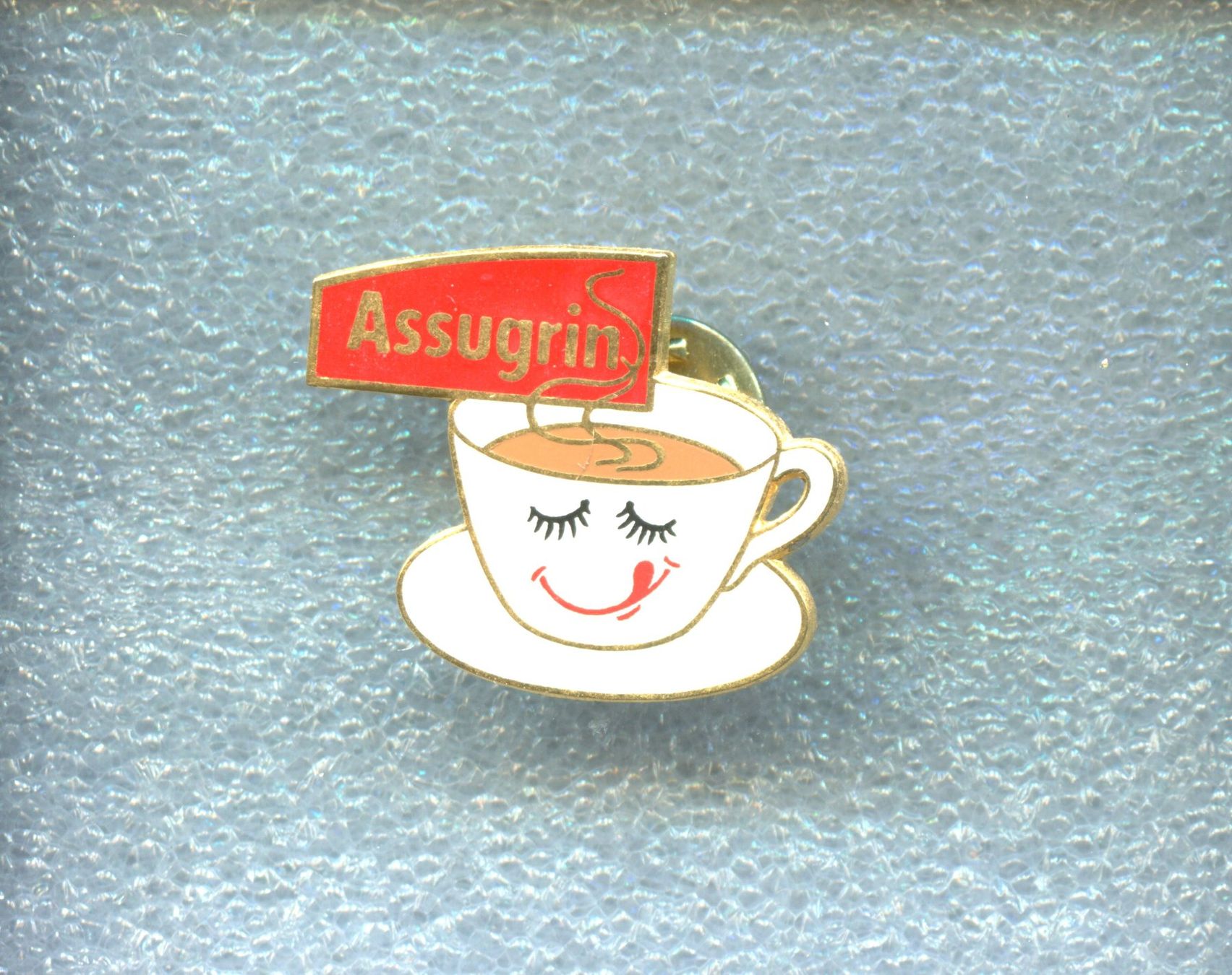 Placchette & Badge: Assugrin – Usato da Winterthur venduto da Sammleroase