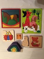 7 Holzpuzzle Tiere und Pferde, zum Teil Handarbeit