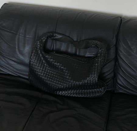 Sac à main en similicuir tressé noir