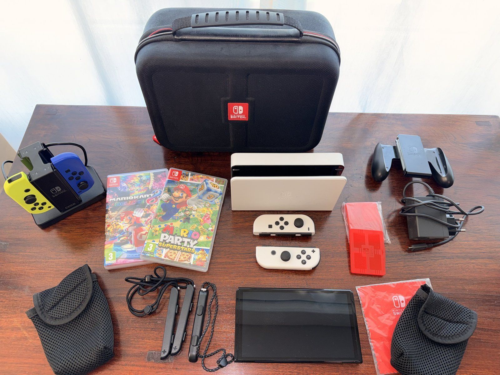 Nintendo Console: Switch OLED Weiss + 4 Joy-Con + 2 Games + Case – Usato da Zürich venduto da swizzmember 1
