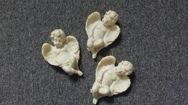 3 Engel liegend