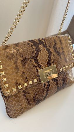 Michael Kors Brown and Gold Shoulder.