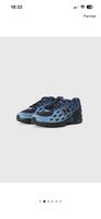 Baskets New Balance 1906R bleues homme T42 état neuf