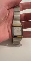 Montre vintage Rado acier/doré, style unique et élégant!