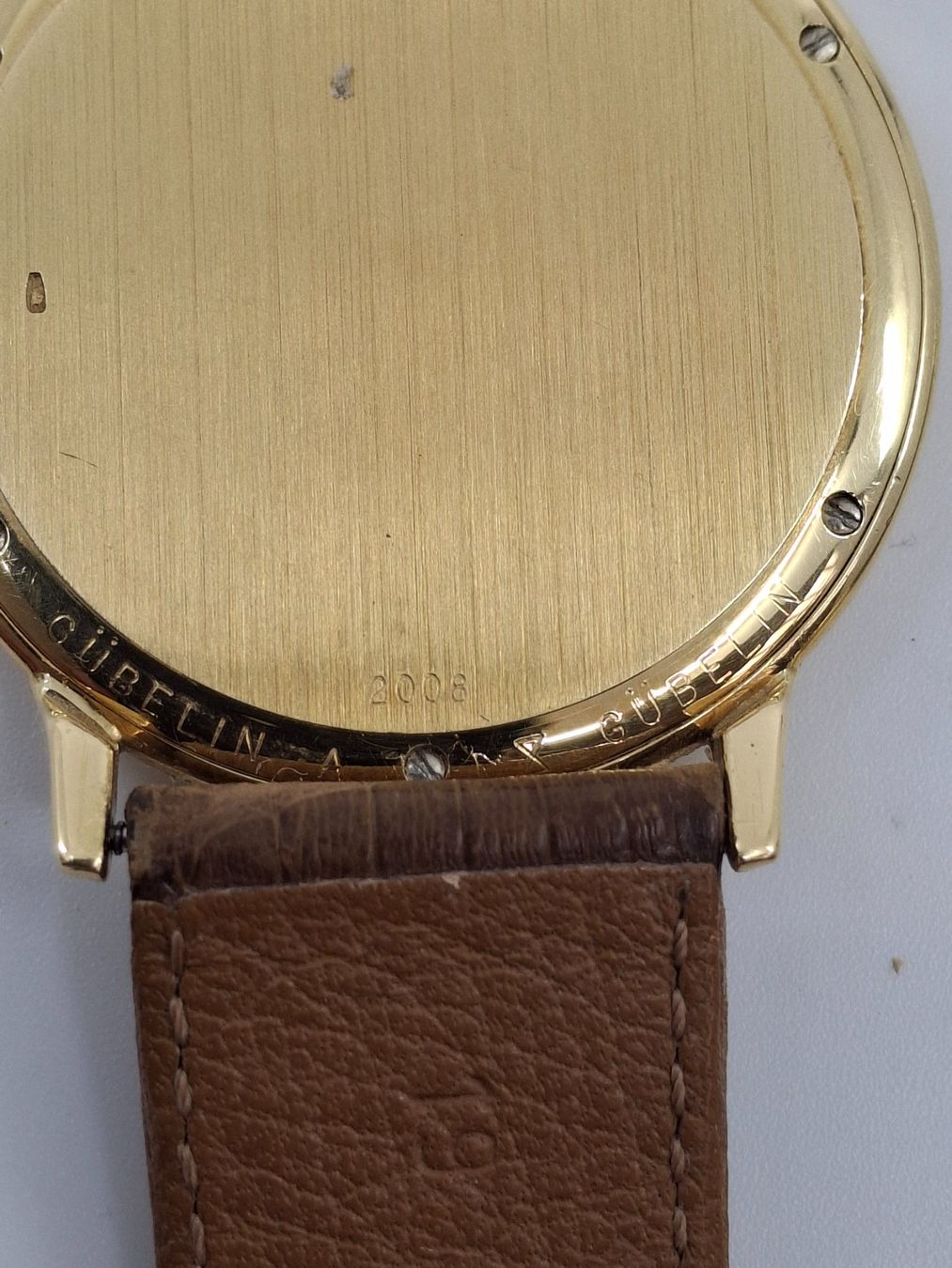 Gübelin Orologi: Gubelin Herrenuhr in 18K Gold – Usato da Basel venduto da Swastikapower 2