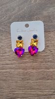 magnifiques boucles d'oreille coeur rose fucchia