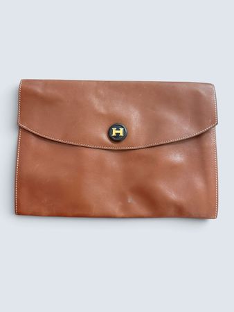 Hermès – Pochette Rio vintage en cuir marron – Fermoir H 