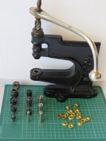 RODUS Hand Press with Eyelet Dies and Eyelets Used