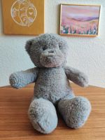 Adorable ours en peluche gris 