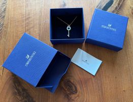 Swarovski, Halskette Augensymbol und Schlüssel