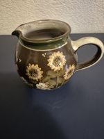 Bemahlter Milchkrug